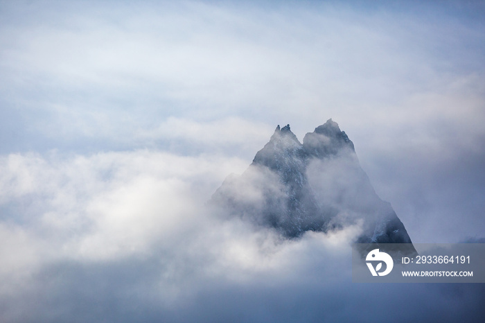 Khumbu Yul Lha mountain shrouded in clouds. Himalayas, Nepal