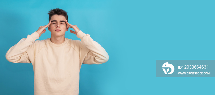 isolated boy or teenager with yoga concentration expression