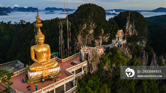 Buddha on the top Mountain of Wat Tham Seua (Tiger Cae) , Krabi,Thailand