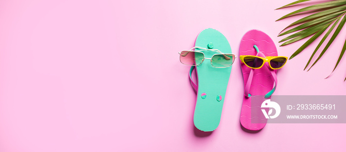 Summer hat with flip flop on pink background