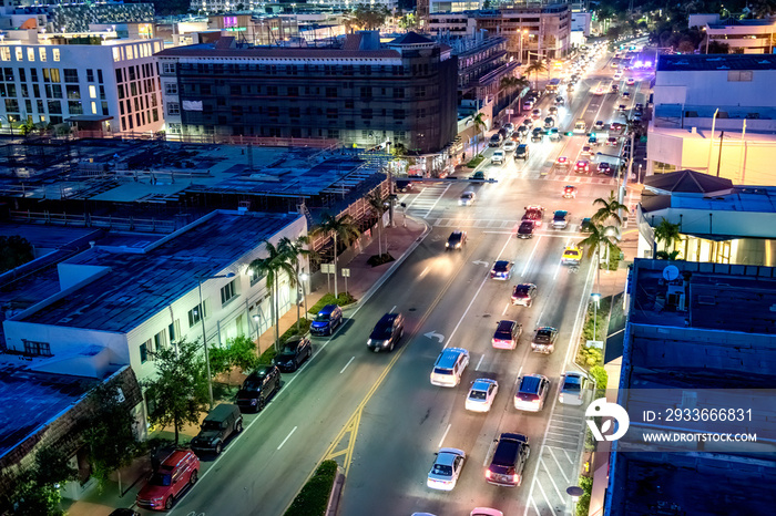 Beautiful buildings and streets of Miami Beach at night, FL