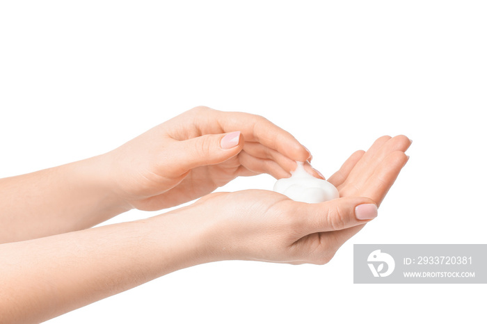 Female hands with foam on white background