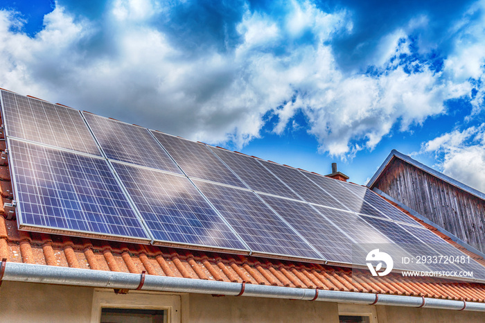 Solar panel on a red roof