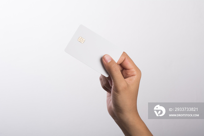 Close up of Woman hand holding blank card isolated on white.