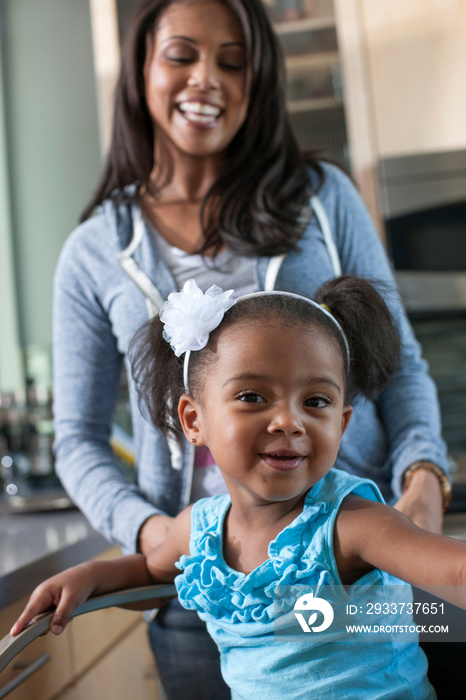 Young girl and mid adult mother, portrait