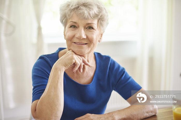 Portrait of senior woman in the sunny day