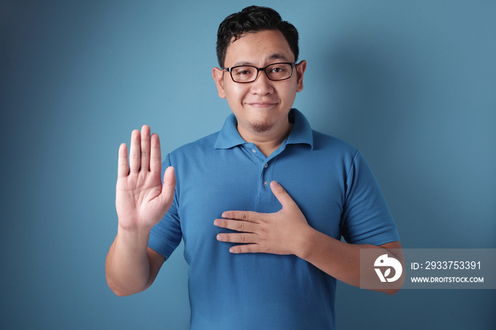 Man Making Pledge Gesture, Hand on Chest, Making Promise