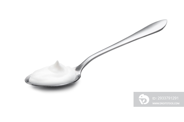 Spoon with tasty yogurt on white background