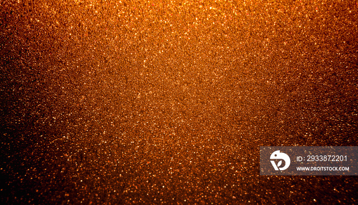 Shiny orange glitter texture background