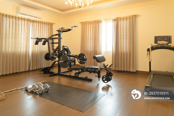 Modern fitness center in home. Private gym equipment decoration. interior design decoration backgrou