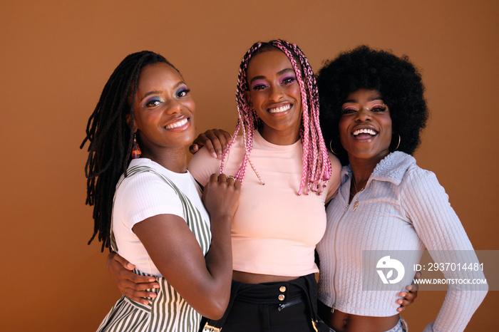 Studio portrait of young friend group smiling