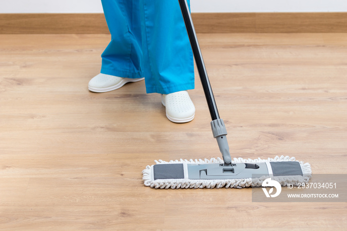 woman mopping the home floor