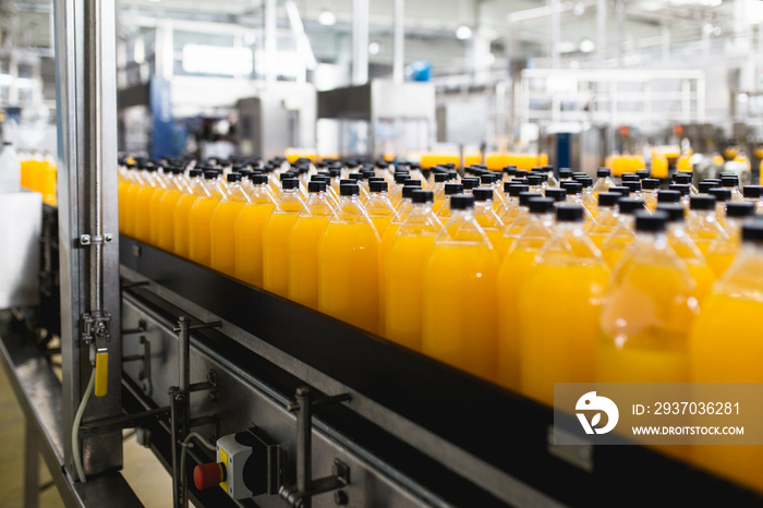 Bottling factory - Orange juice bottling line for processing and bottling juice into bottles. Select