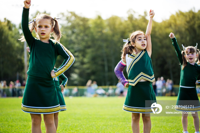 Cheerleaders (4-5,  6-7) during football match