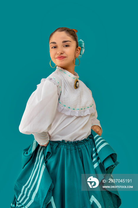 latin adolescent woman with traditional folk costume with multicolored background, dancer and mexica