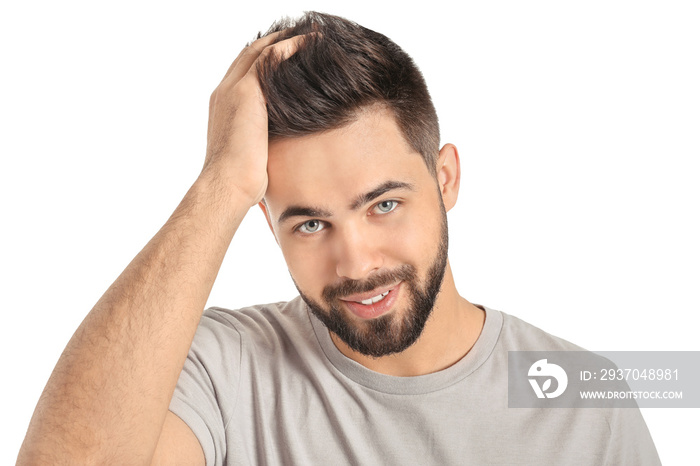 Handsome man with healthy hair on white background