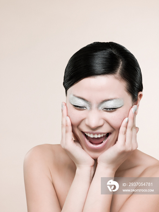 A young woman laughing