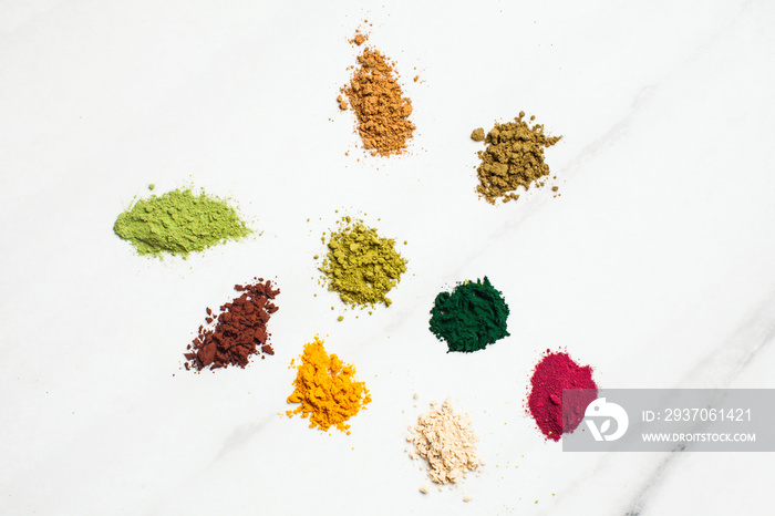 Top view various dietary supplements scattered on the table