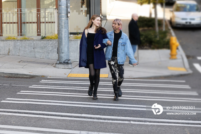 Lgbtqia friends walking outside together.