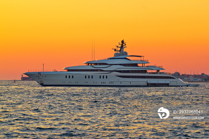 Superyacht on yellow sunset view