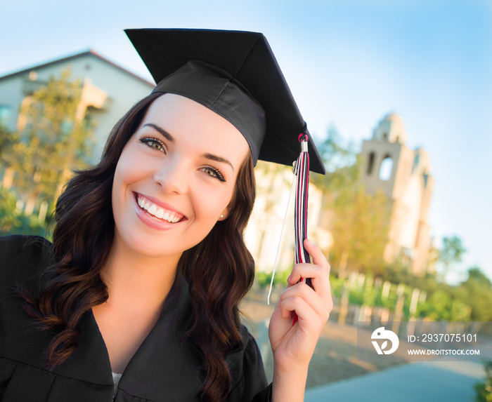 Happy Graduating Mixed Race Woman In Cap and Gown