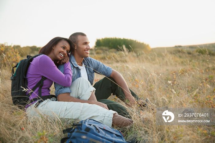 Couple relaxing after their outdoor hike