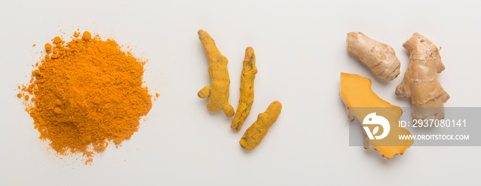 Turmeric extract powder and root on white background