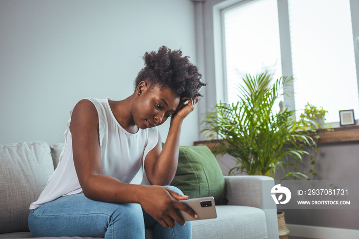 Sad young black woman portrait feeling negative emotions. Young girl in trouble feeling sad and depr