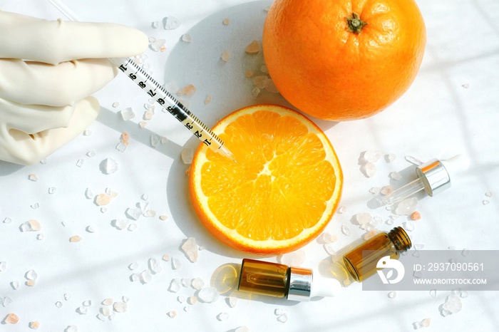 Natural Vitamin C beauty product concept, Organic orange extraction for pharmaceutical skin care.