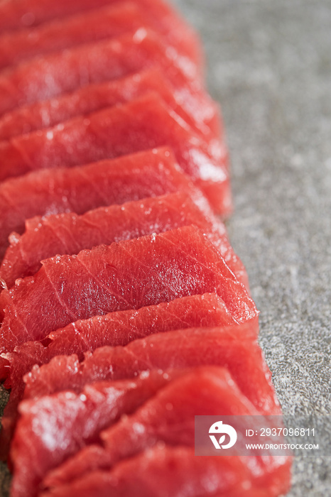 Sliced tuna with sashimi knife