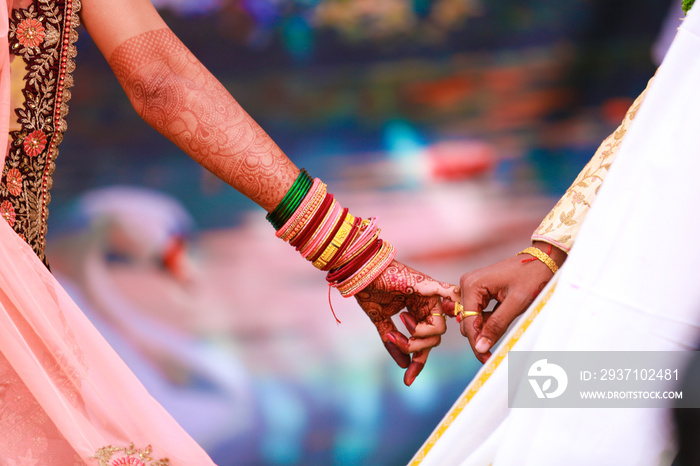 Indian couple hand in wedding Satphera ceremony in hinduism