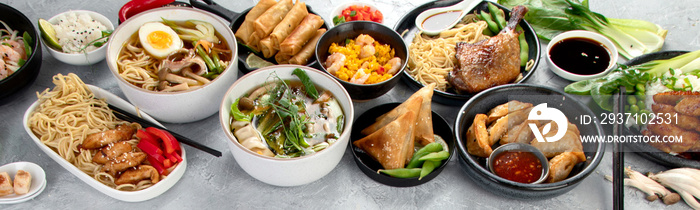 深灰色背景上的各种亚洲菜肴和小吃。传统食品概念。