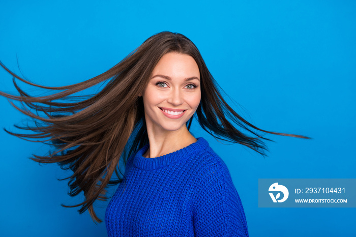 Portrait of attractive cheerful carefree girl throwing healthy smooth hair motion isolated over vibr