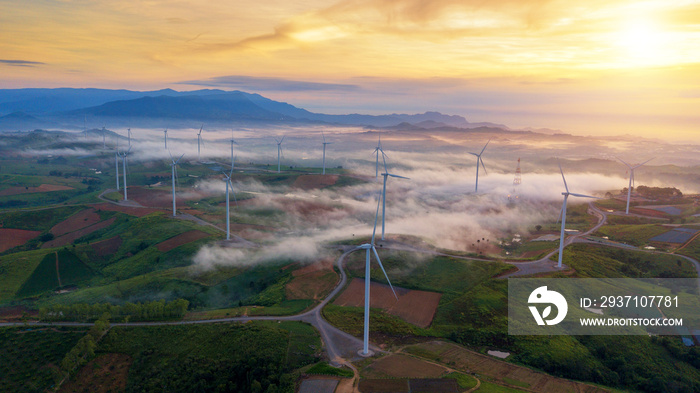 Green Energy Wind Turbine, Aerial view sunrise from Drone flying Wind turbines produce electricity n