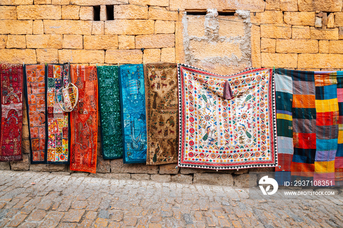 Indian style oriental carpets at old street market in Jaisalmer, India