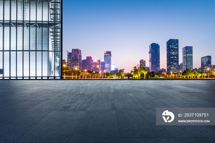 Panoramic skyline and modern commercial office buildings with empty floor in Shenzhen, China.