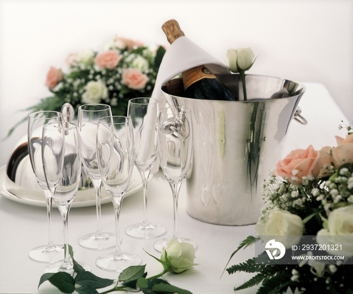Champagne, roses and flutes