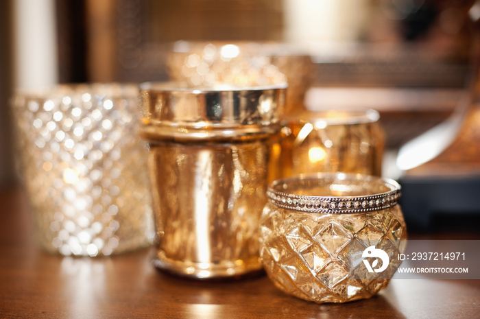 Close-up of candle holders on table against blurred background at home; Scottsdale; USA