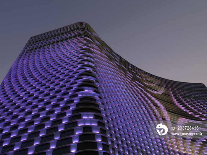 Low angle view of illuminated hotel building with purple lighting at dusk