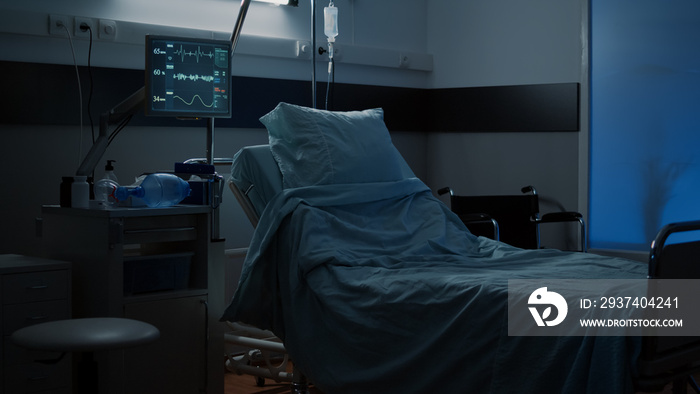 Modern hospital ward with comfortable empty bed used for medical treatment. Nobody in facility room 