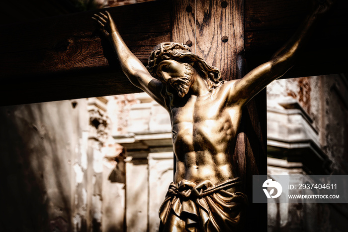 Сrucifixion of Jesus Christ on wooden cross (concept of self-sacrifice, suffering)