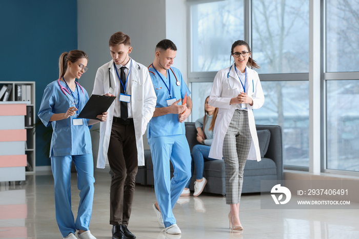 Doctors discussing results of analyses in clinic