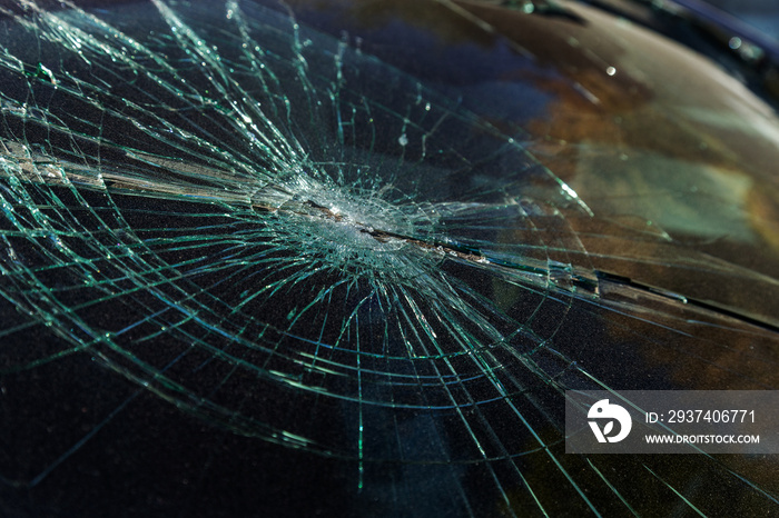 Terrible dangerous car after a fatal accident. Broken windshield. A broken car with broken glass. Сa