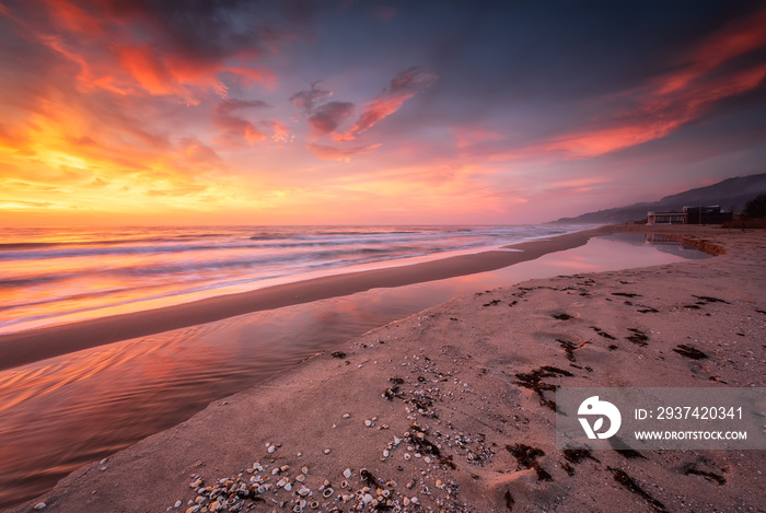 On the seashore at sunrise