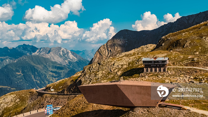 Beautiful alpine summer view with a big steel memorial at the famous Timmelsjoch high alpine road, D