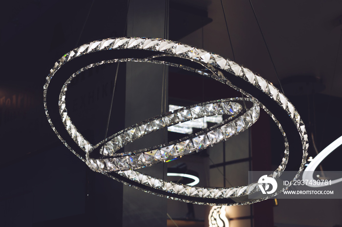 Crystal rings LED chandelier pendant light. Modern chandelier in the form of rings decorated with gl