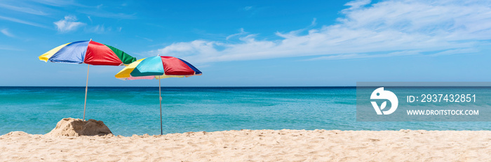 Two umbrella on the tropical beach. Summer Holiday Banner