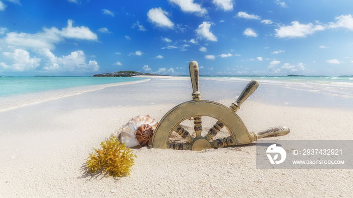 Ship steering wheel on the beautiful beach, Bahamas Florida