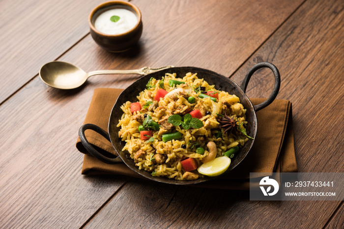 Kheema Pulao - Rice cooked with mutton or chicken mince with vegetables and spices. served in a bowl