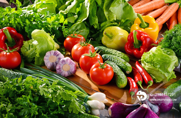 Composition with variety of fresh organic vegetables and fruits